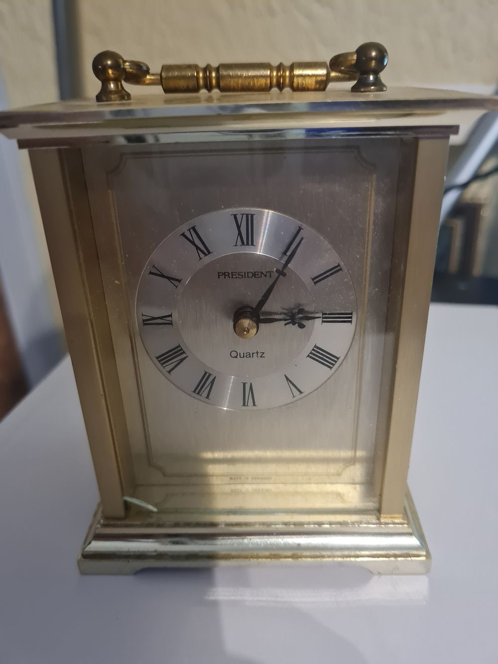 Lot 192: President brass clock