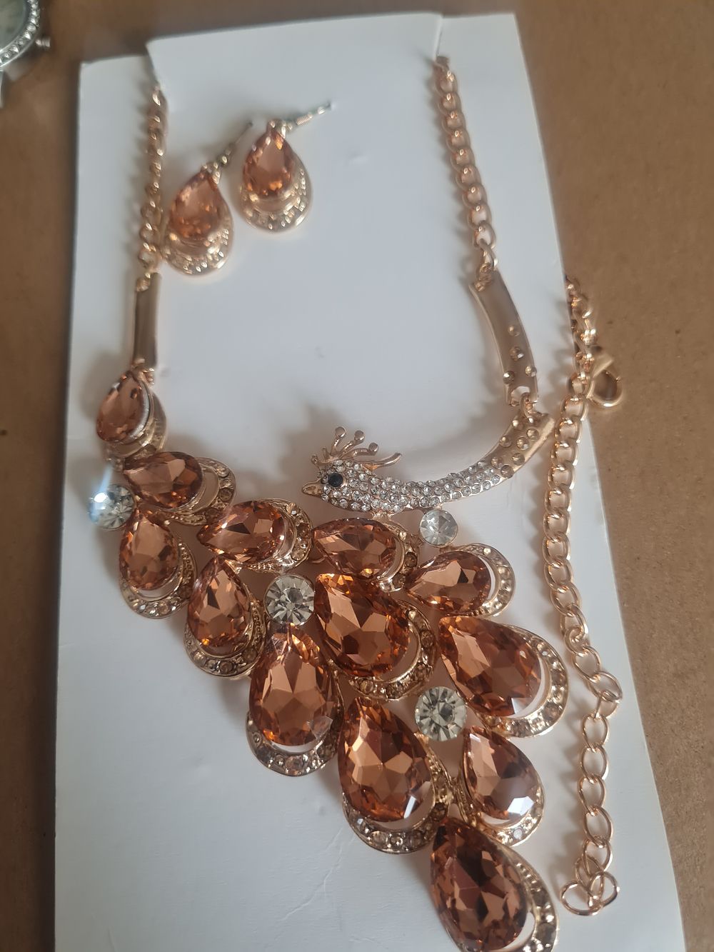 Lot 199: Peacock new chain and earings set