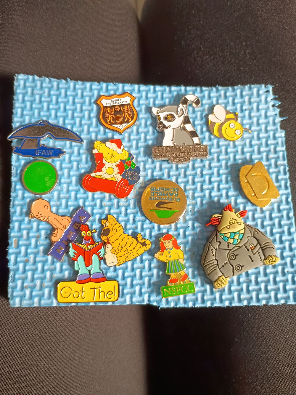 Lot 203: Collection of pin badges
