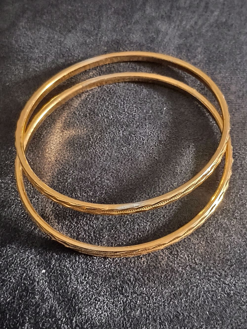 Lot 343: 2 solid bracelets with inscription