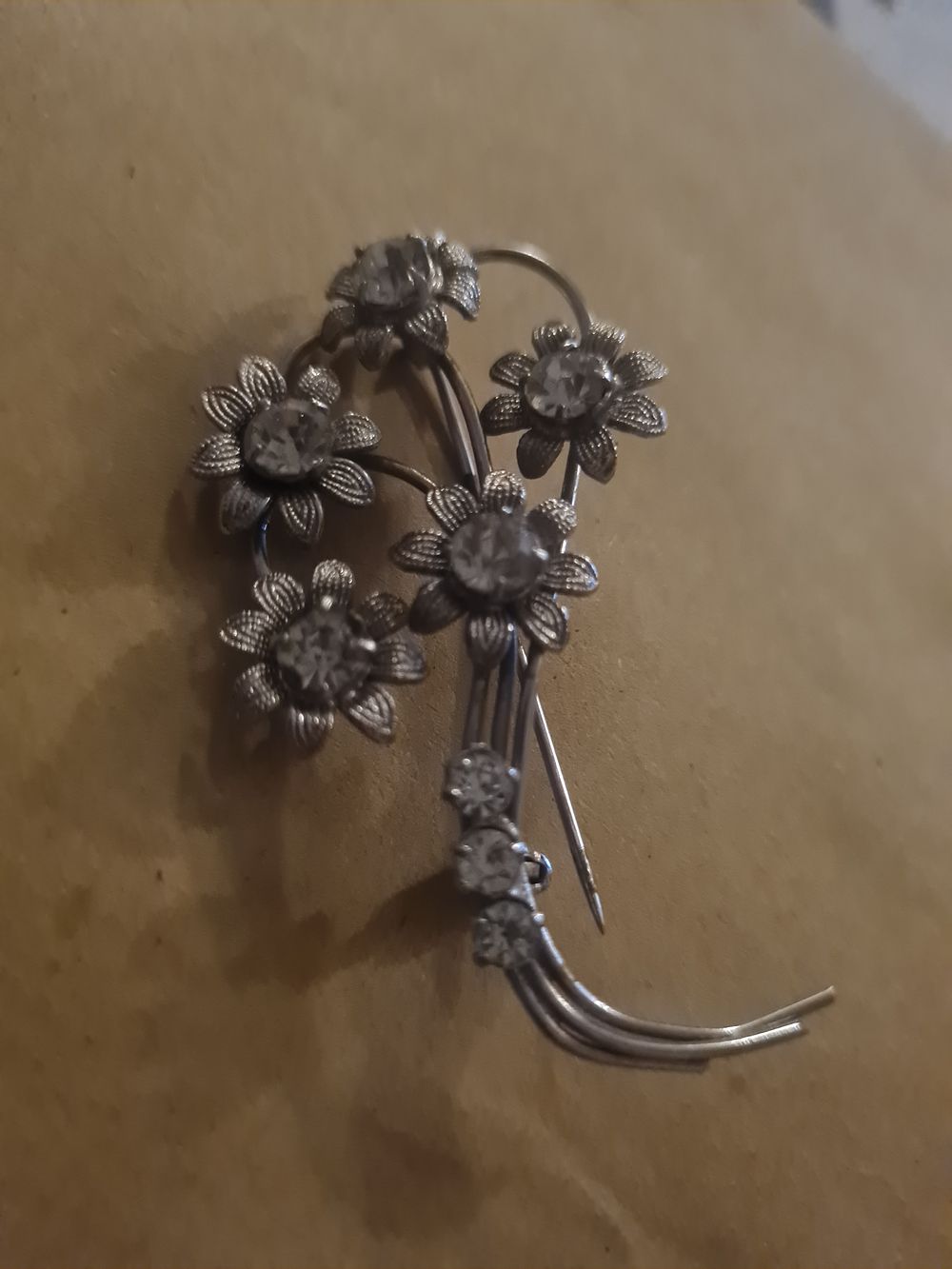Lot 139: Large flower brooch