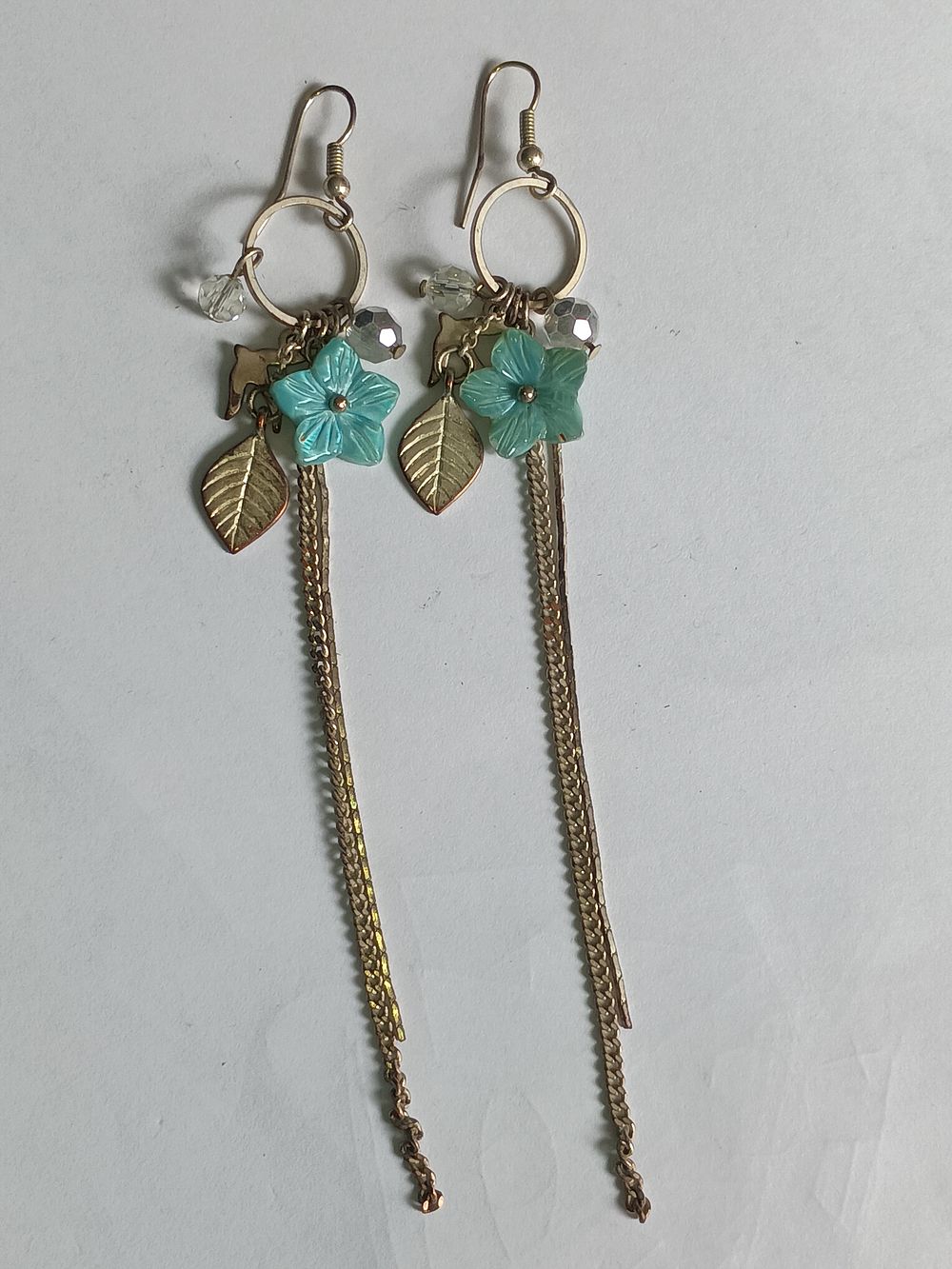 Lot 211: Pair of multi pendant Earrings