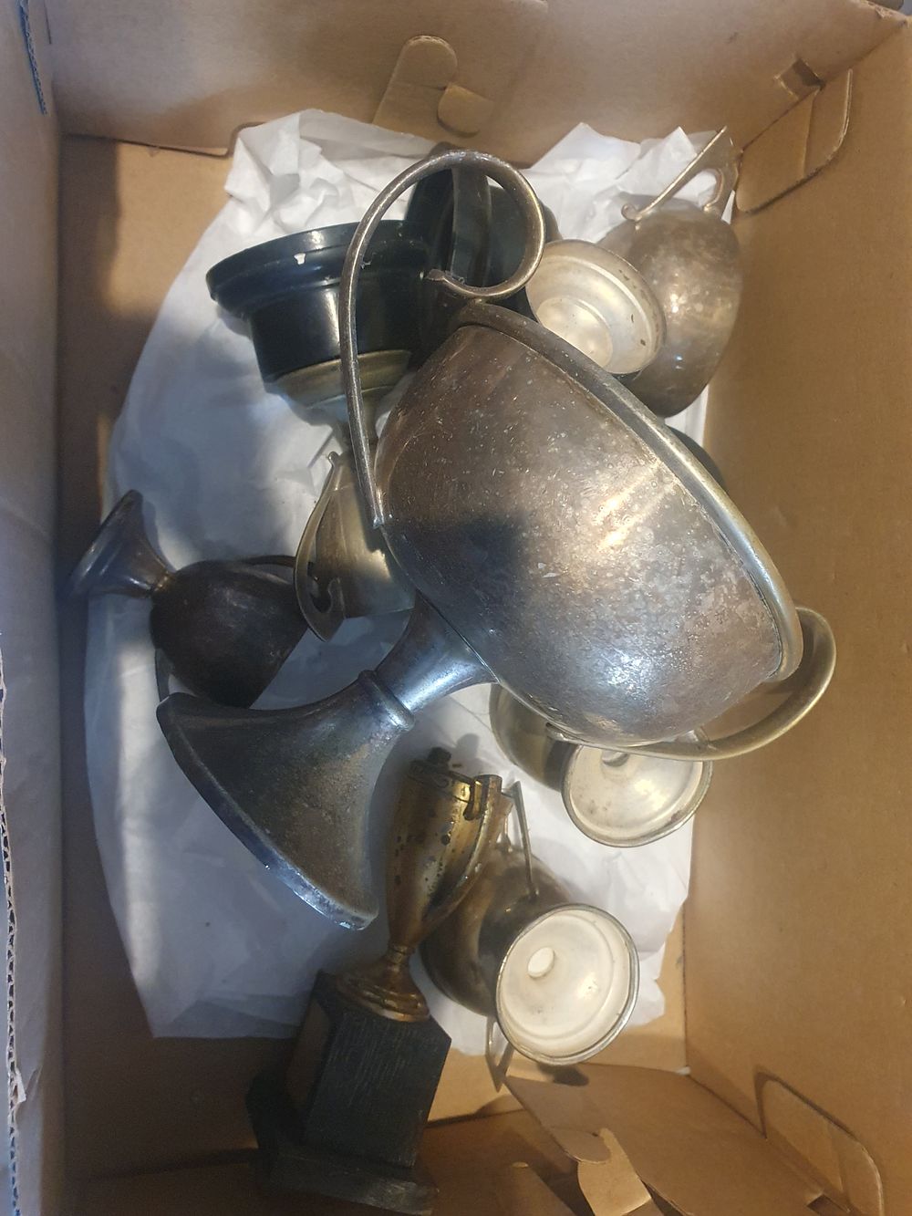 Lot 146: Box of vintage thropies