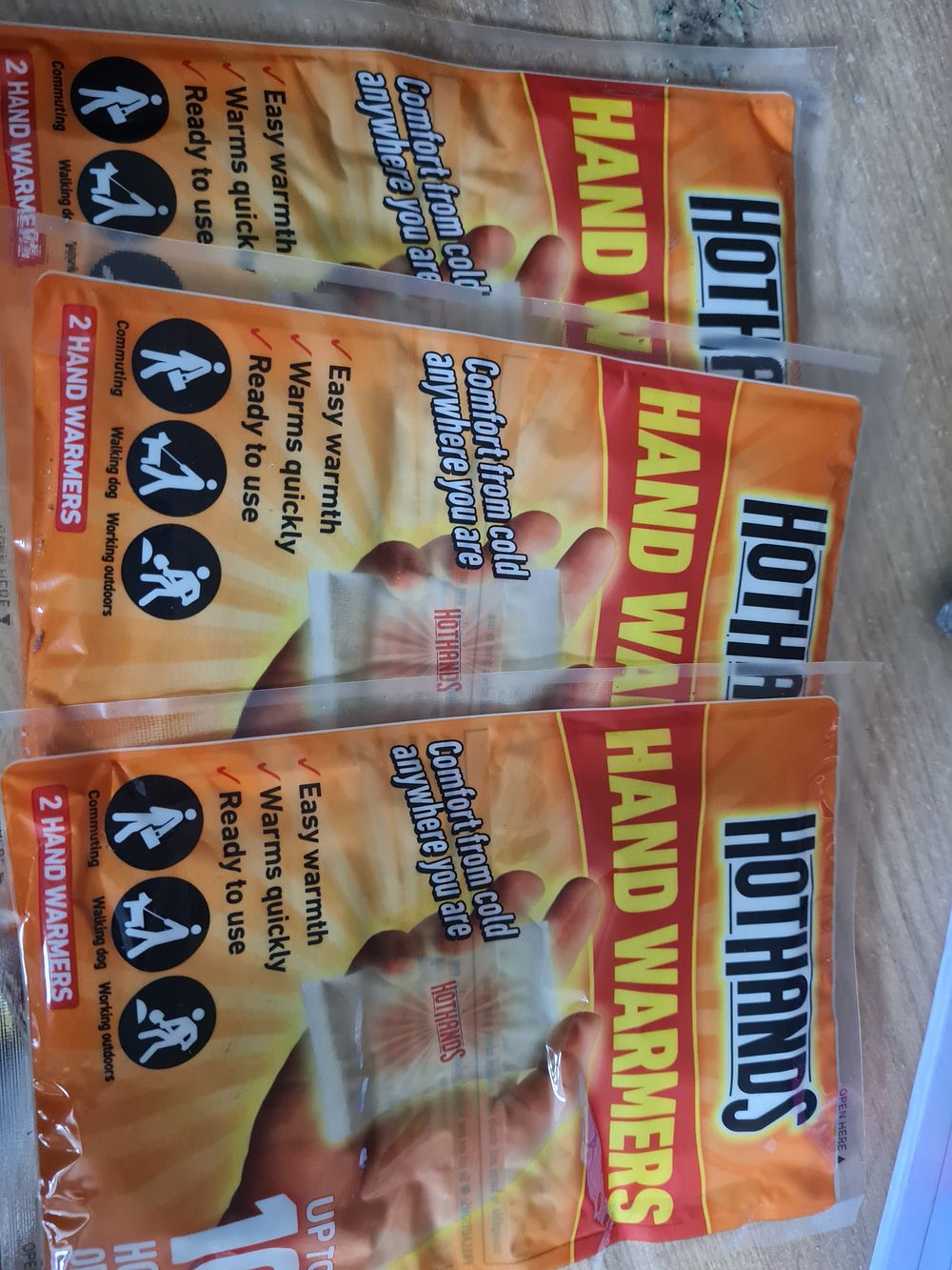 Lot 379: 3 new hand warmers