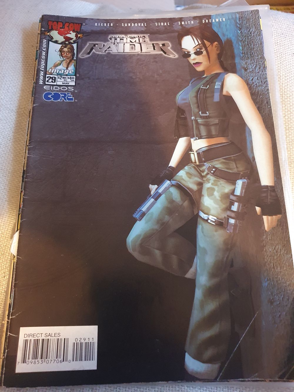 Lot 129: Large croft tome raider