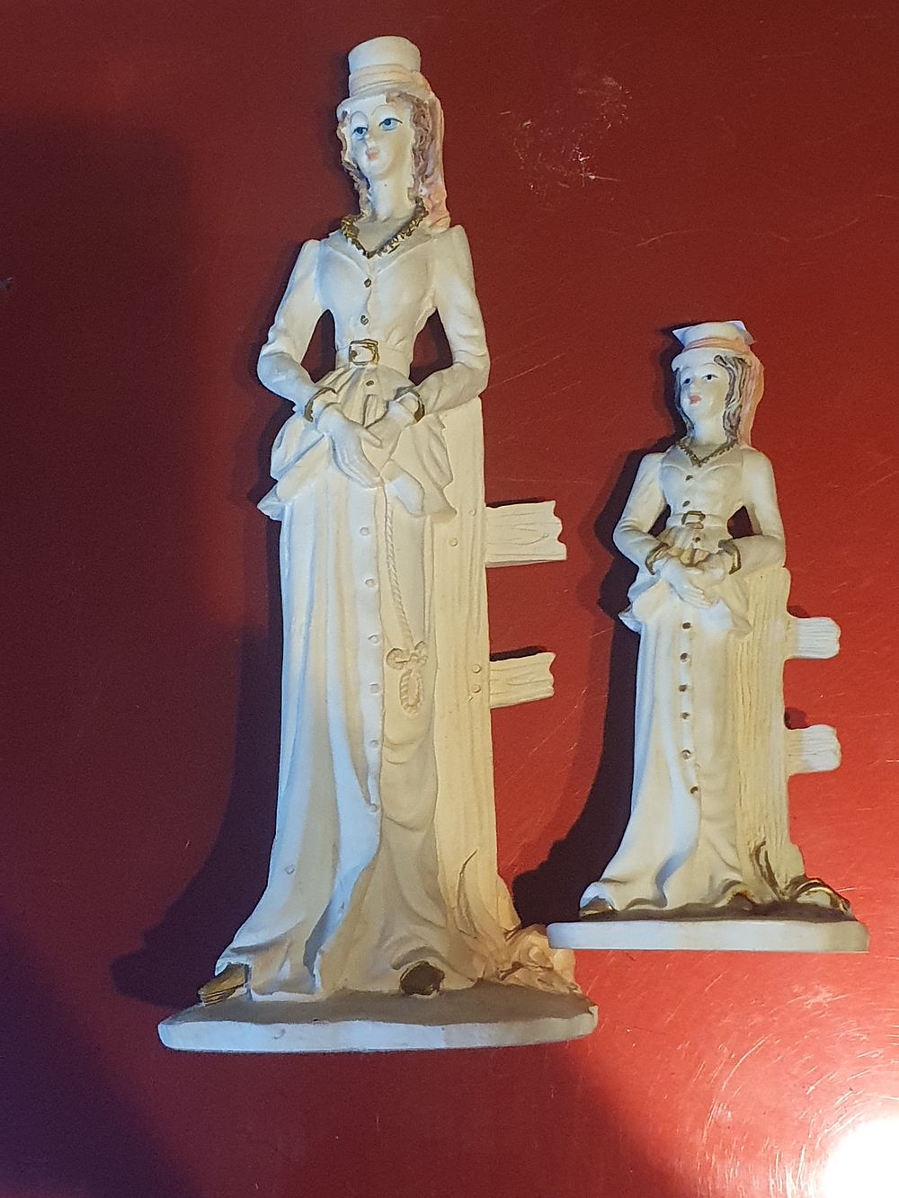 Lot 251: Pair of Vintage figurines