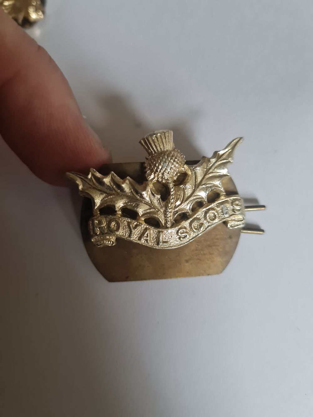 Lot 341: ROYAL SCOTS COLLAR BADGE IN BRASS
