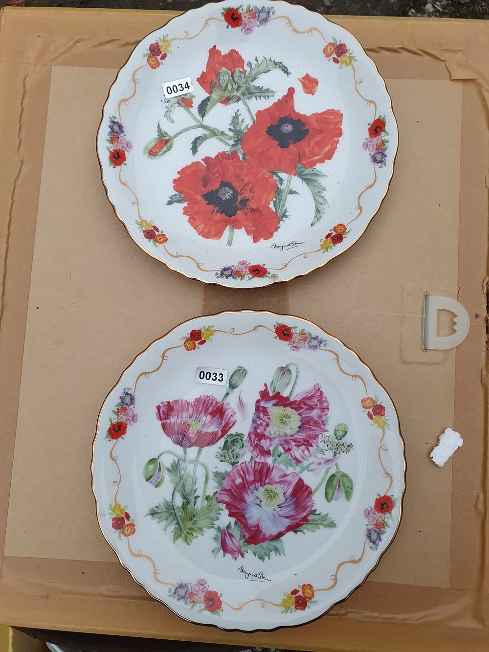 Lot 54: 2 poppy plates