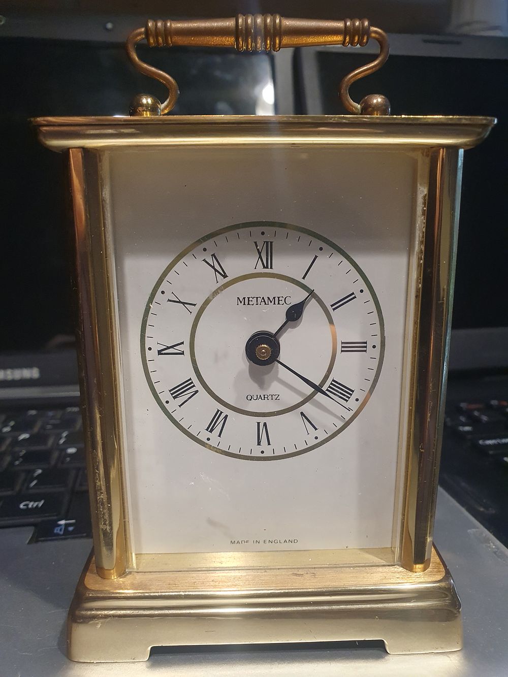 Lot 177: Vintage brass metamec clock