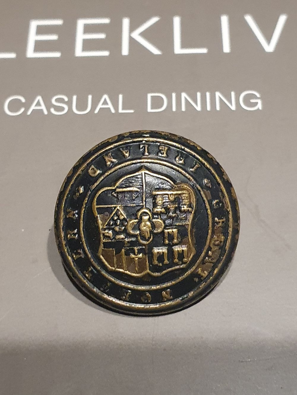 Lot 190: Vintage uniform button