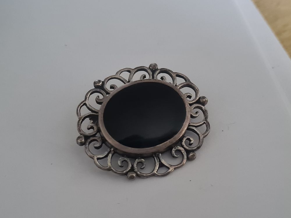 Lot 238: Vintage silver stamped broach