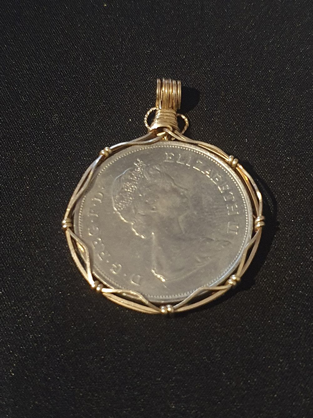 Lot 317: Vintage coin in gold?? mount