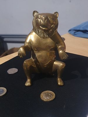 Large brass bear