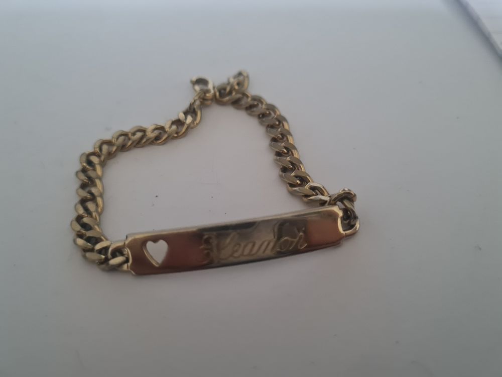 Lot 331: Stamped id bracelet