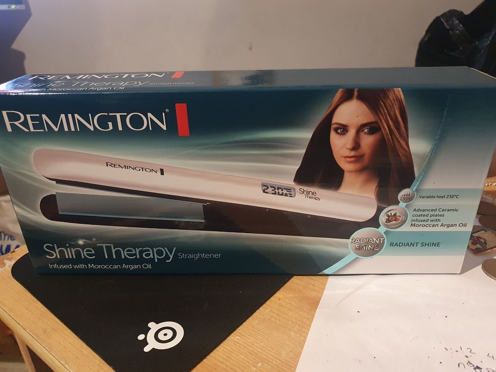 Lot 120: As new Remington hair straighteners