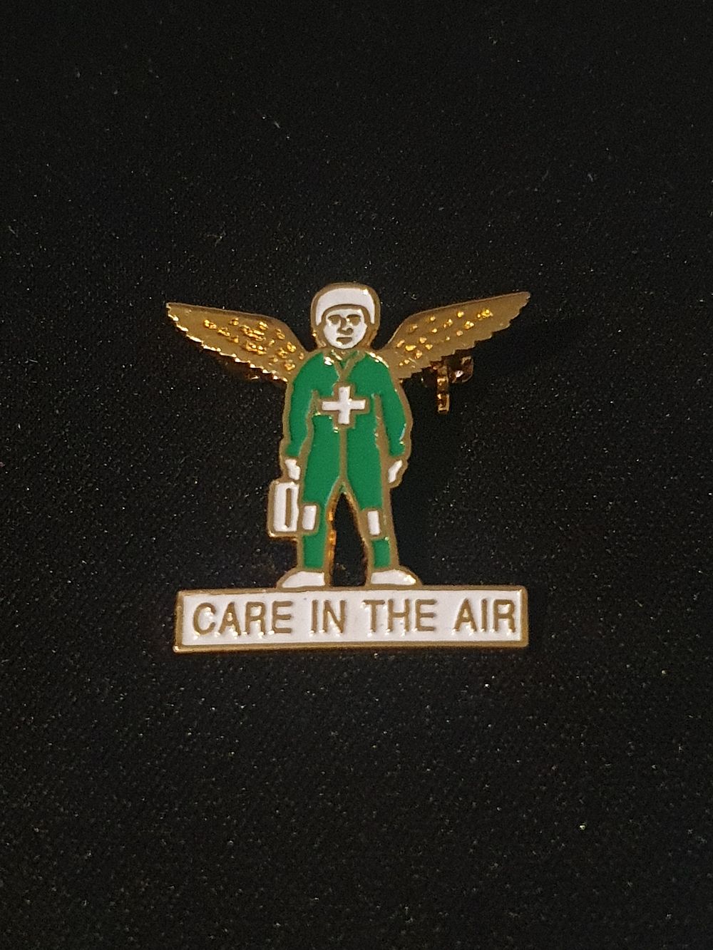 Lot 126: Care in air badge
