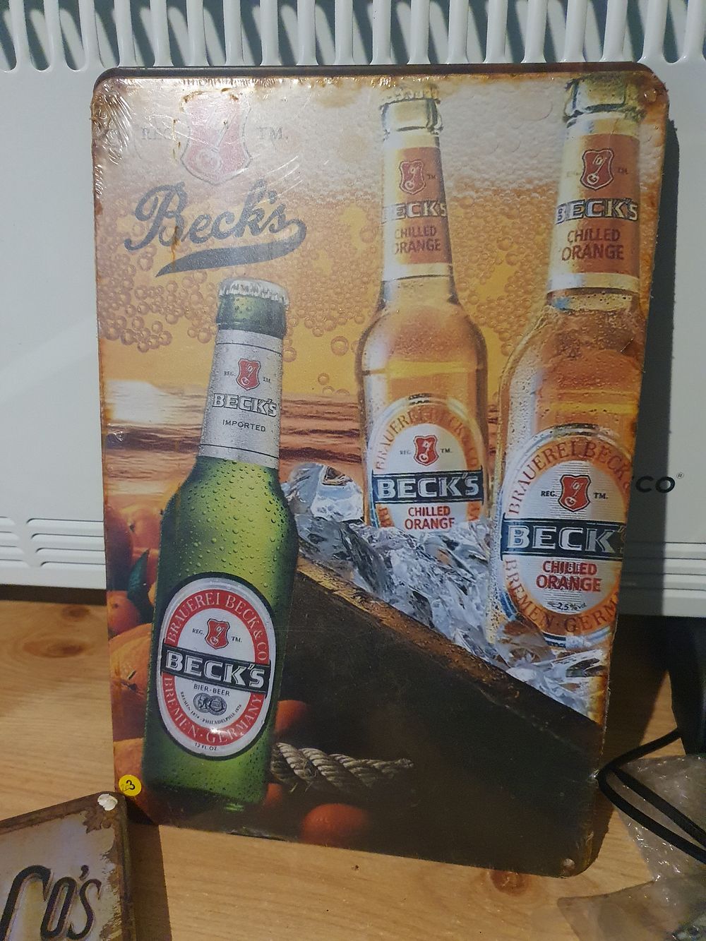 Lot 97: Becks tin sign