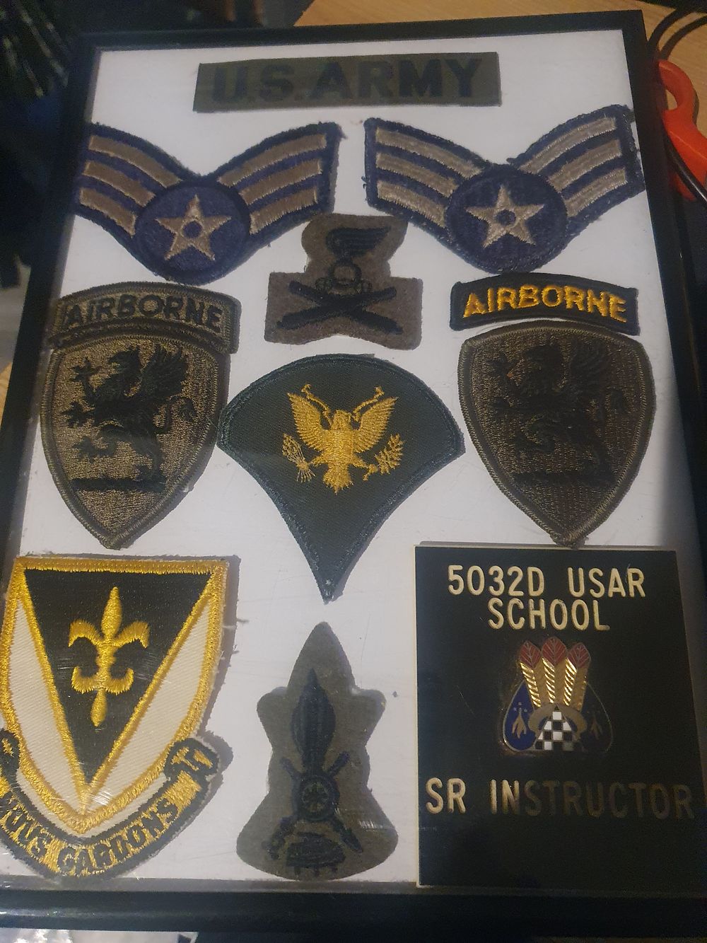 Lot 8a: Framed us army patches