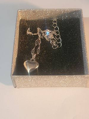 Long silver stamped chain with pendant