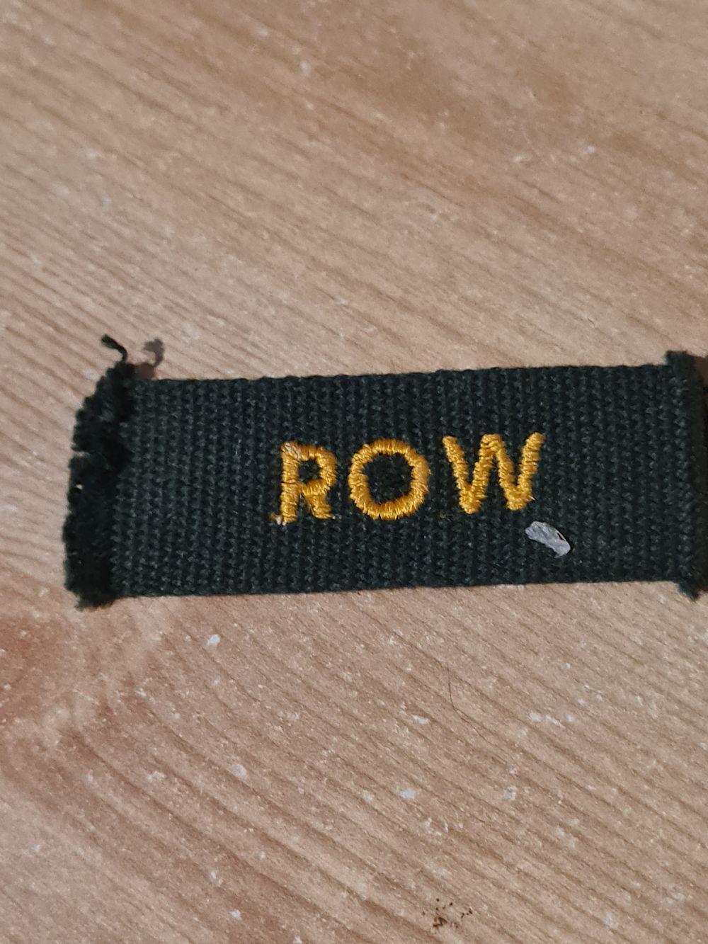 Lot 144: Military shoulder badge