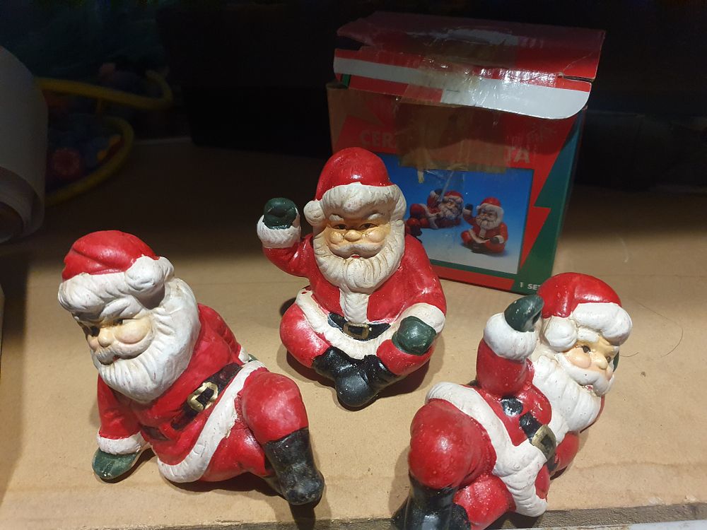 Lot 260: 3 boxed Santa's
