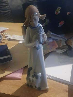 Large Spanish figure with cat