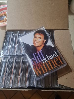 Box full of cliff Richards gazettes