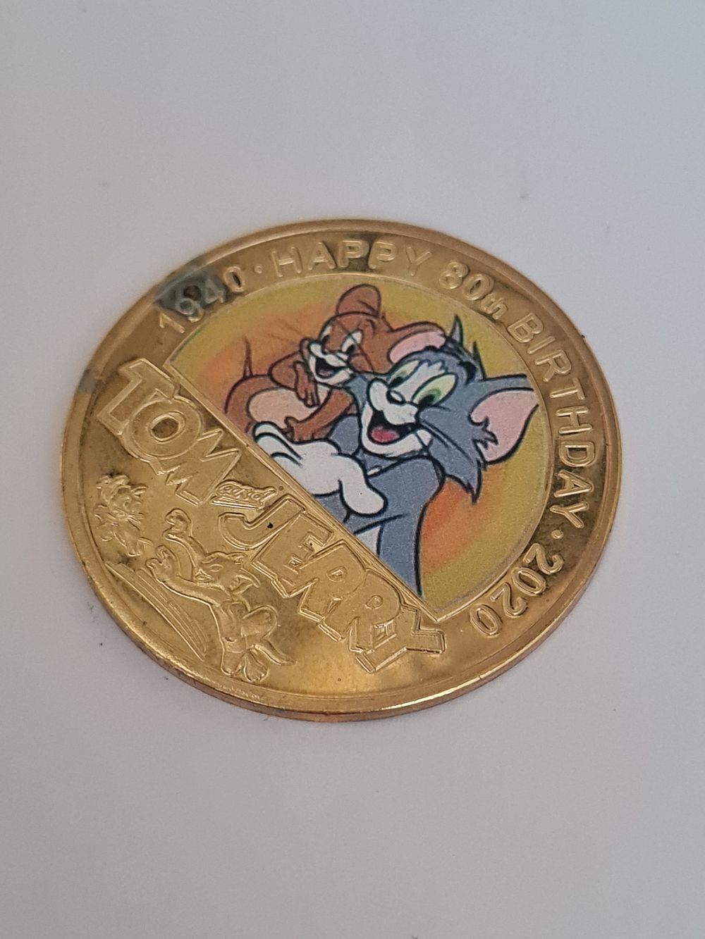 Lot 220: Tom and gerry coin