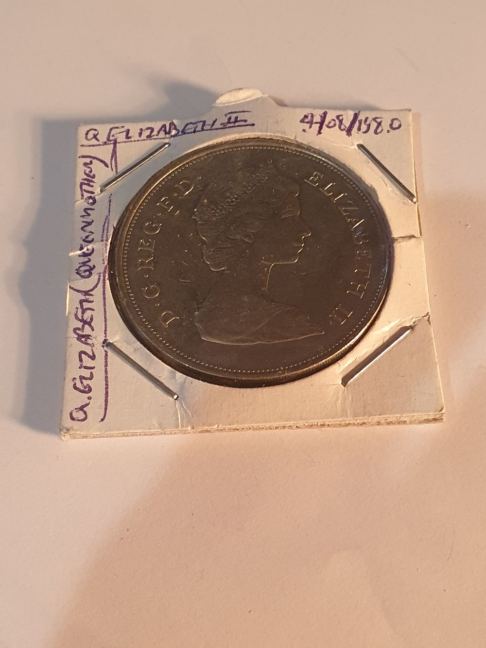 Lot 452: Vintage queen mother coin
