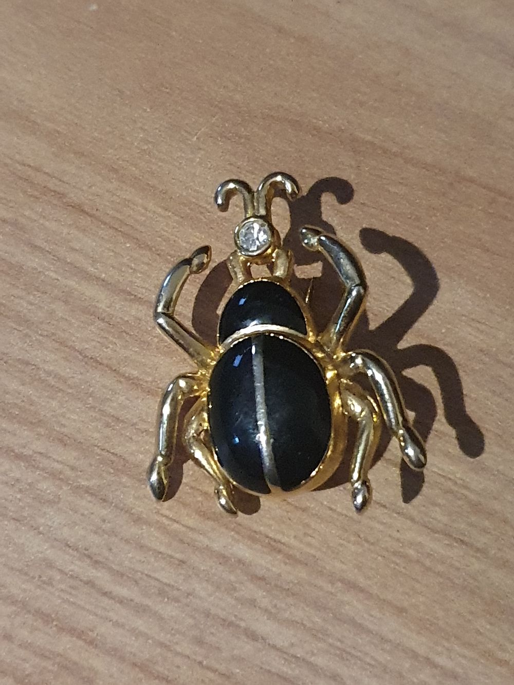 Lot 120: Beatle broach