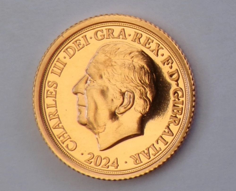Lot 5d: 22ct gold quarter sovereign