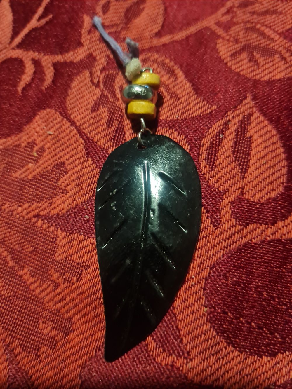 Lot 236: Feather pendant