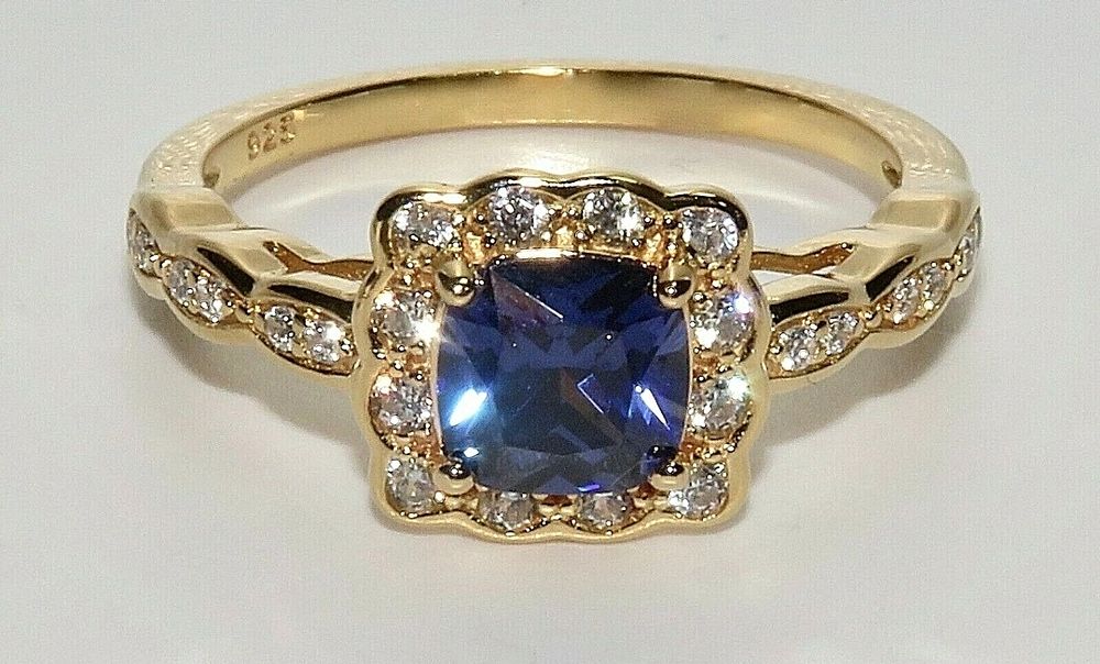 Lot 234: 9ct Gold on Silver Tanzanite & Diamond Ring -