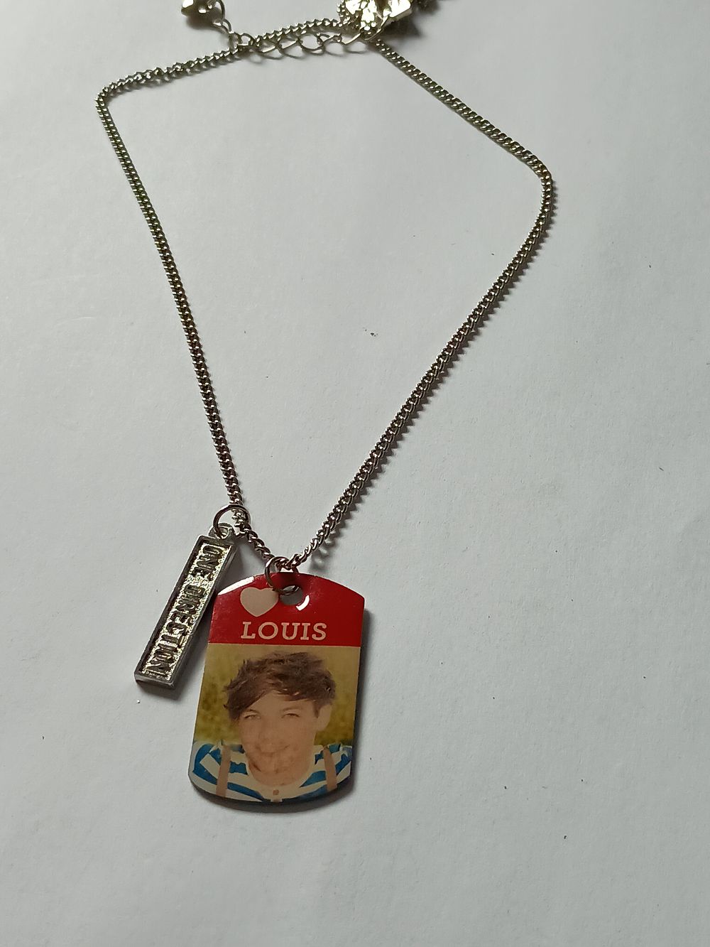 Lot 111: One Direction Dog Tag Pendant on Chain