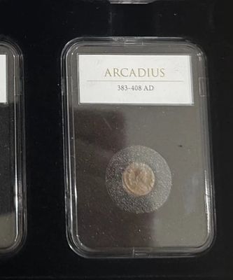 Roman empire coin in slab case