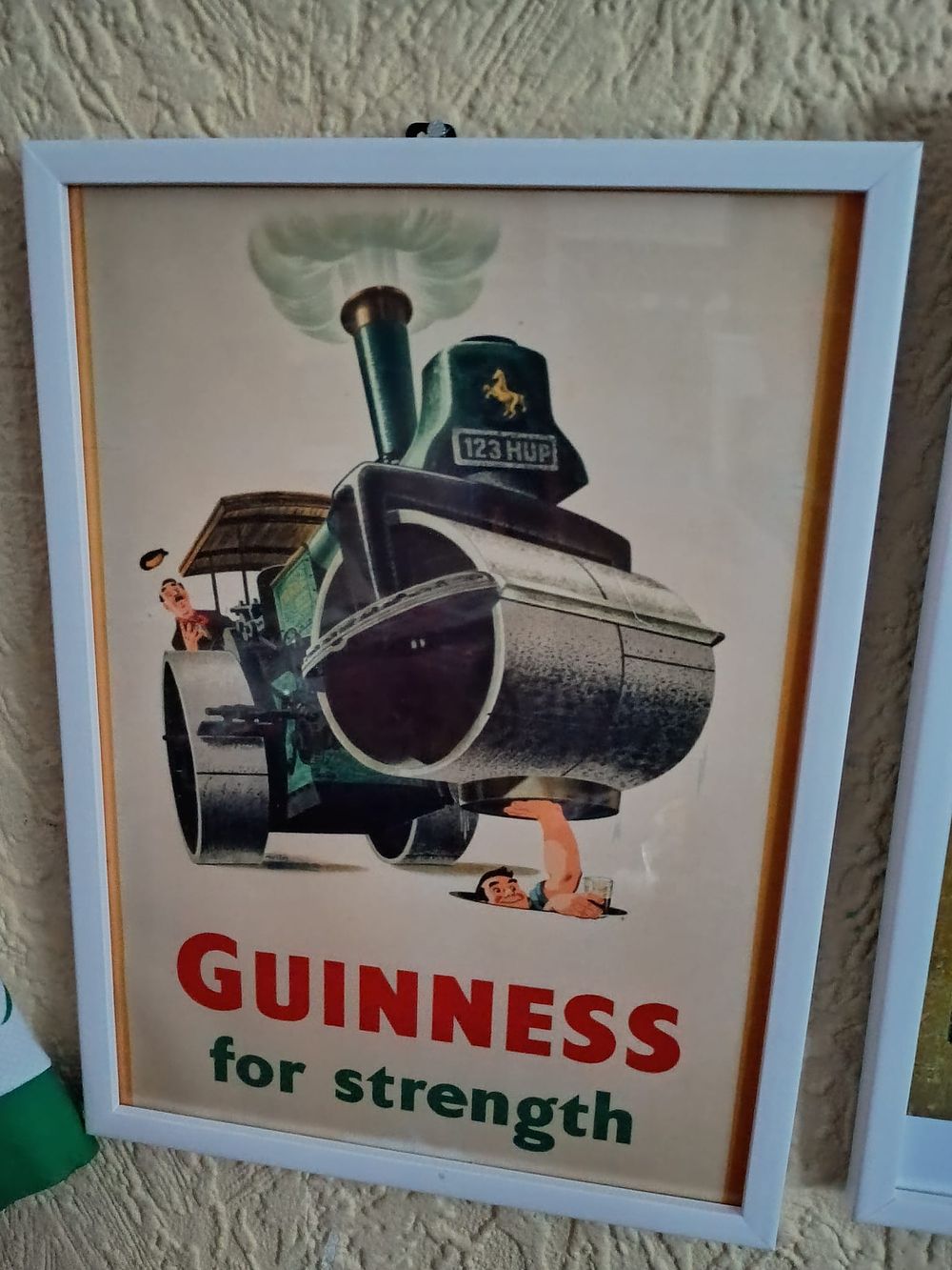 Lot 218: Framed guinness picture