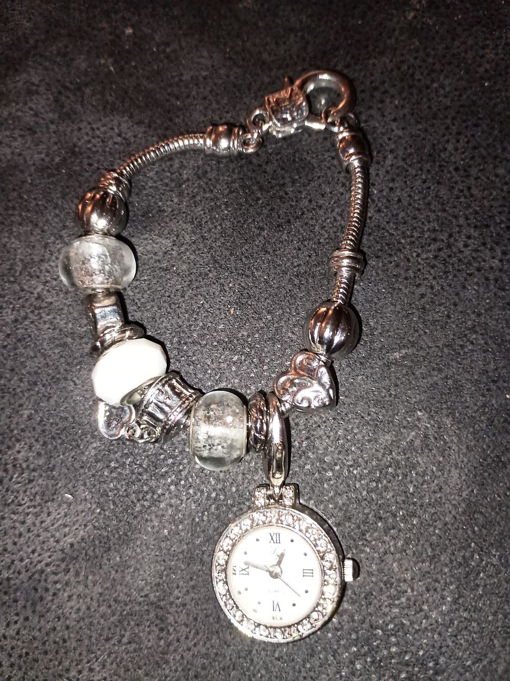 Lot 399: Pandora style bracelet plus watch