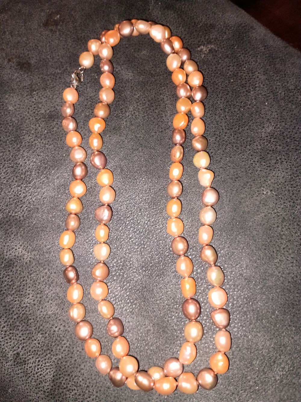 Lot 404: Long string coloured pearls
