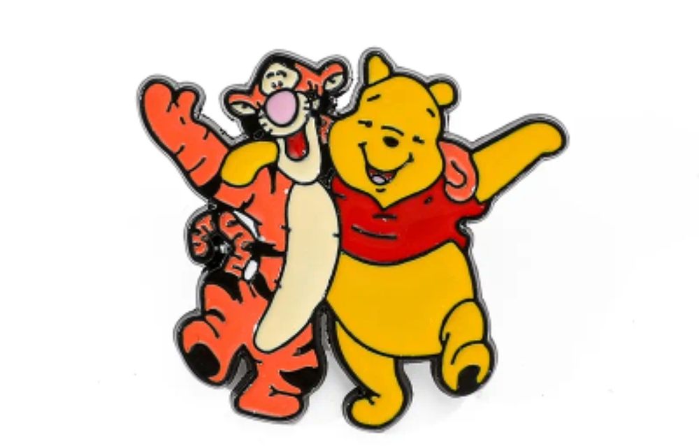 Lot 202: Winnie the poo badge