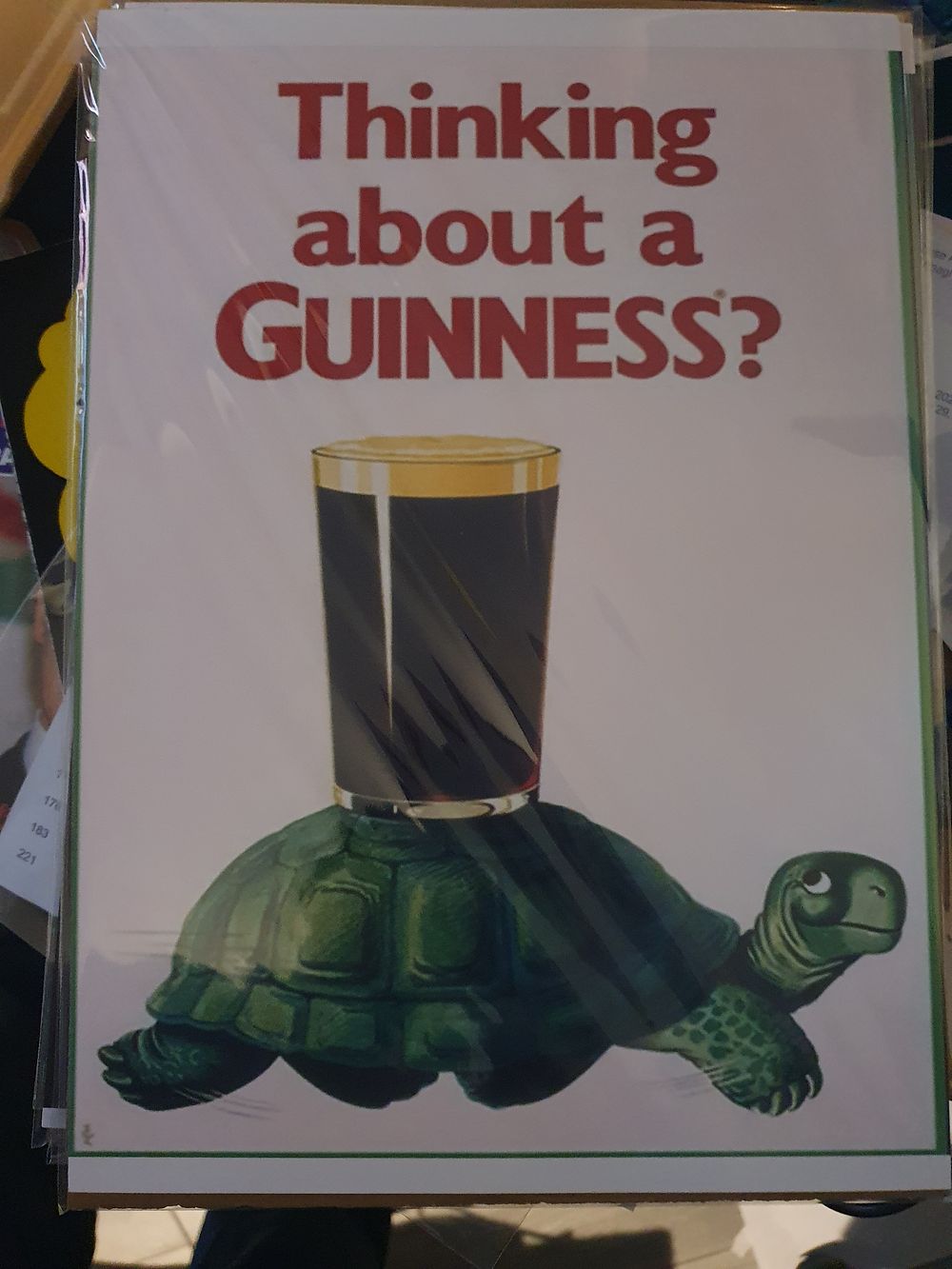 Lot 243: High gloss print in cardboard sleeve guinness