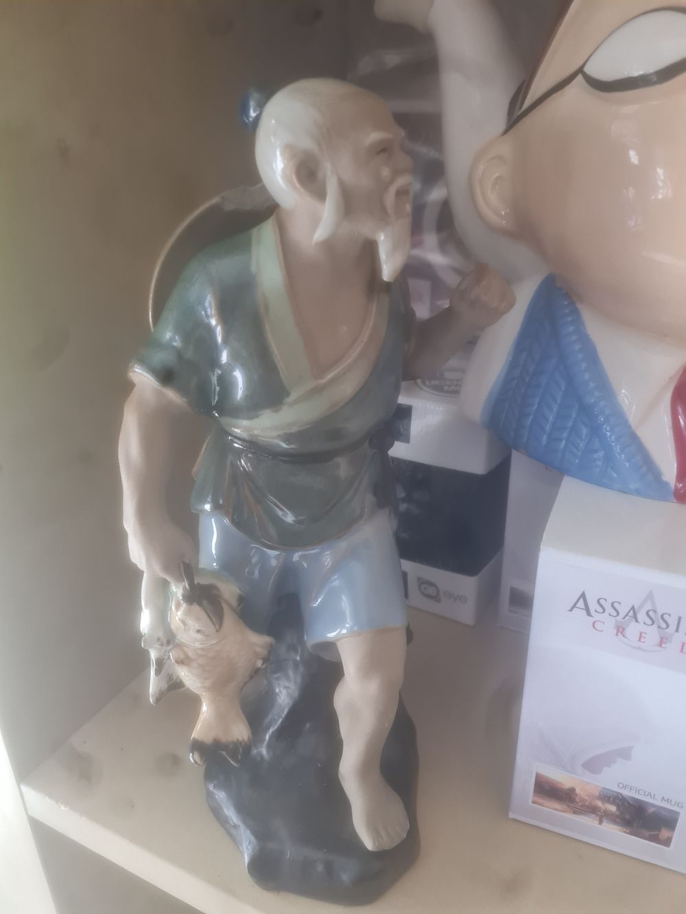 Lot 248: Vintage fishermen figure
