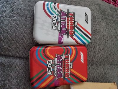 2 soccer tins