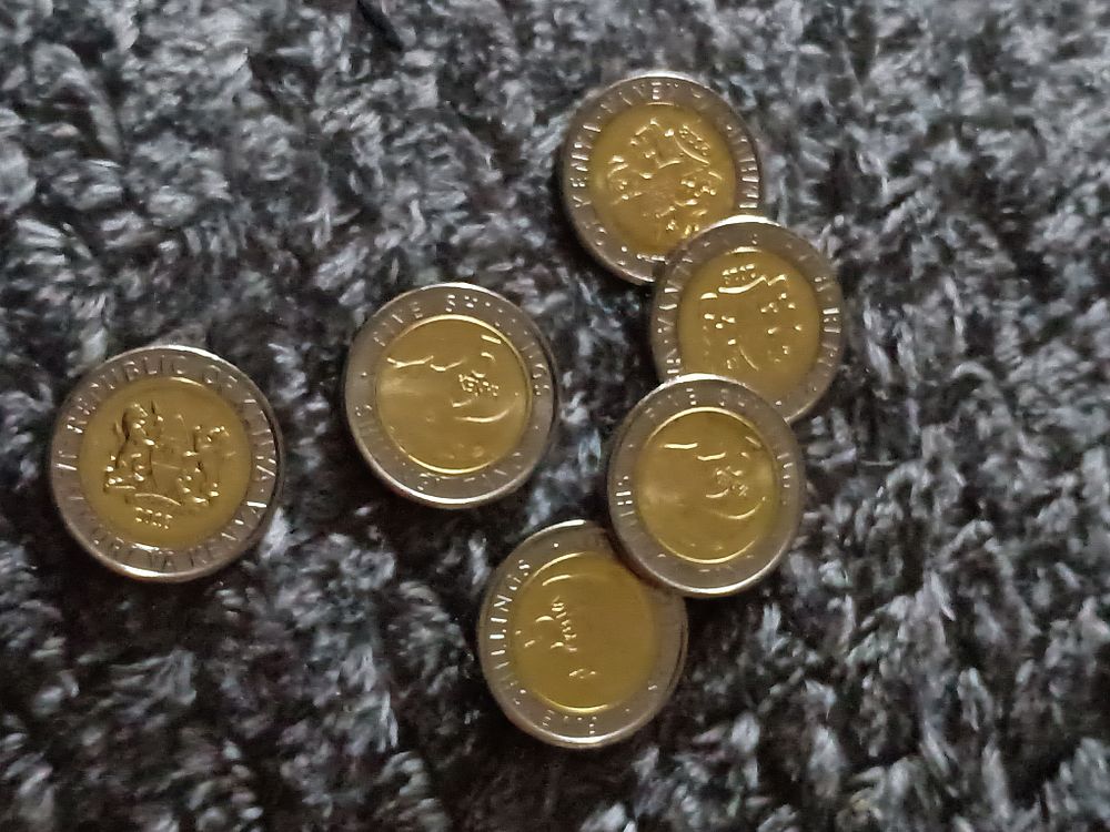 Lot 102: Collection of Kenya coins