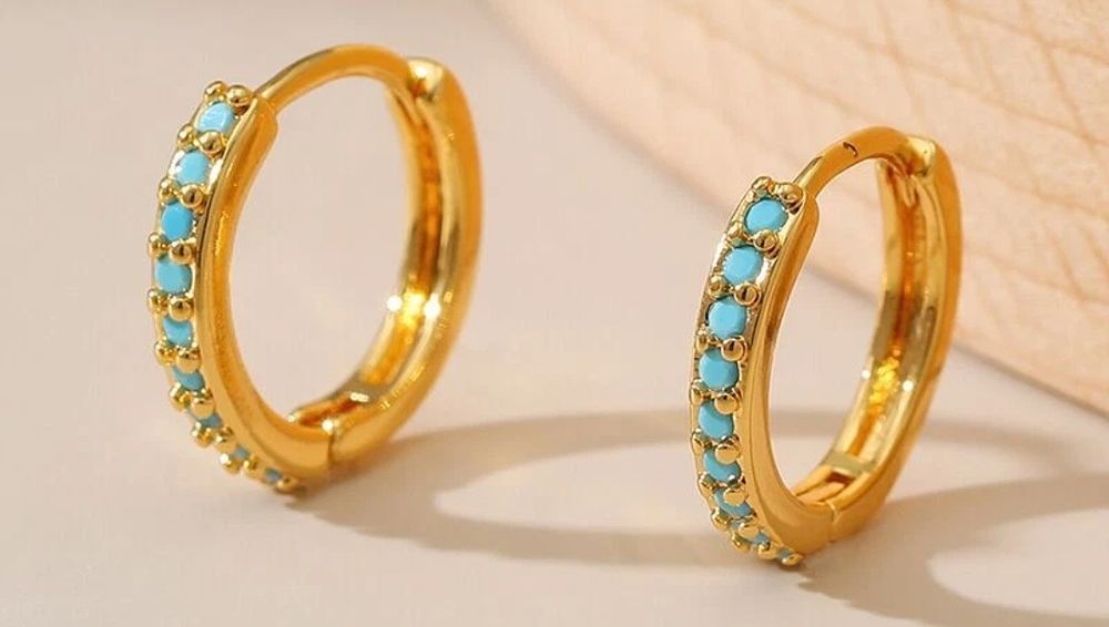 Lot 132: 18k gold plated huggie earings