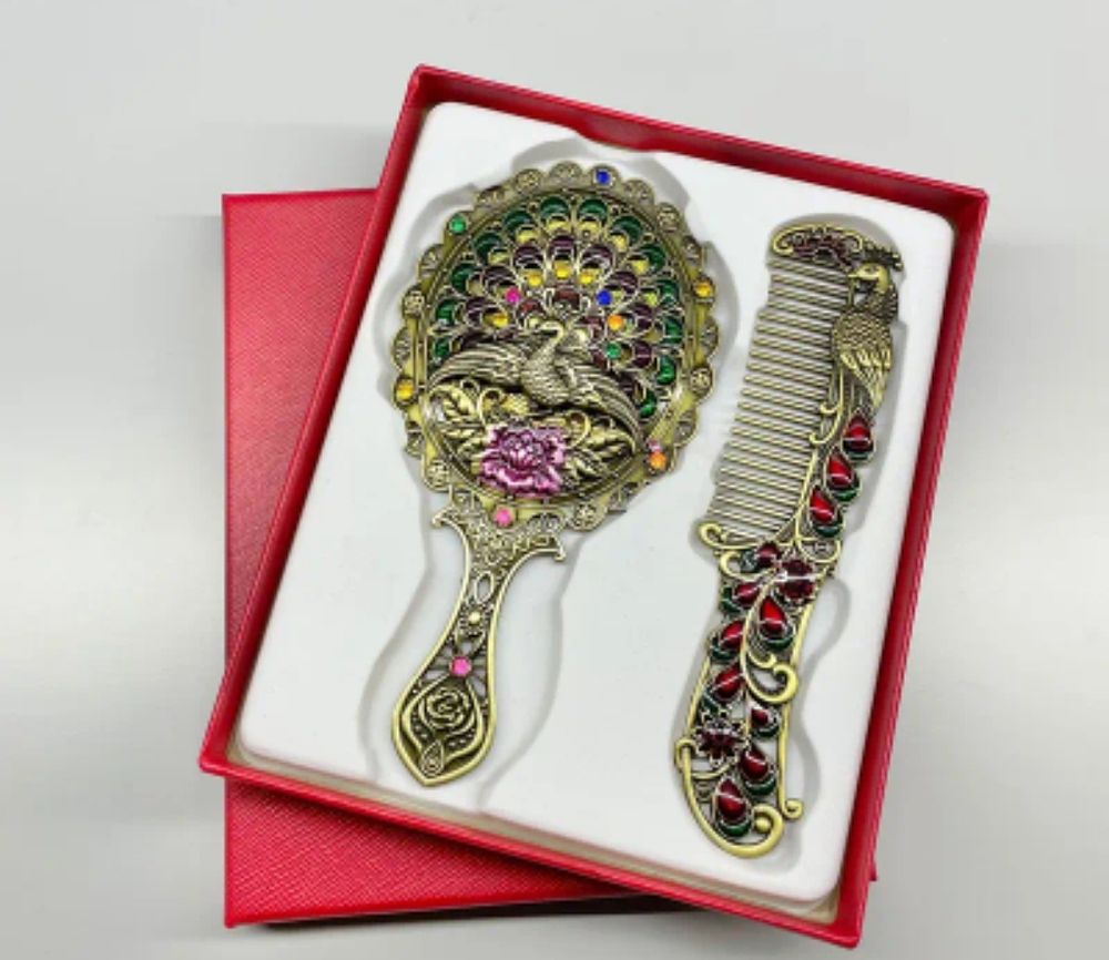 Lot 190: New peacock hair mirror & brush set
