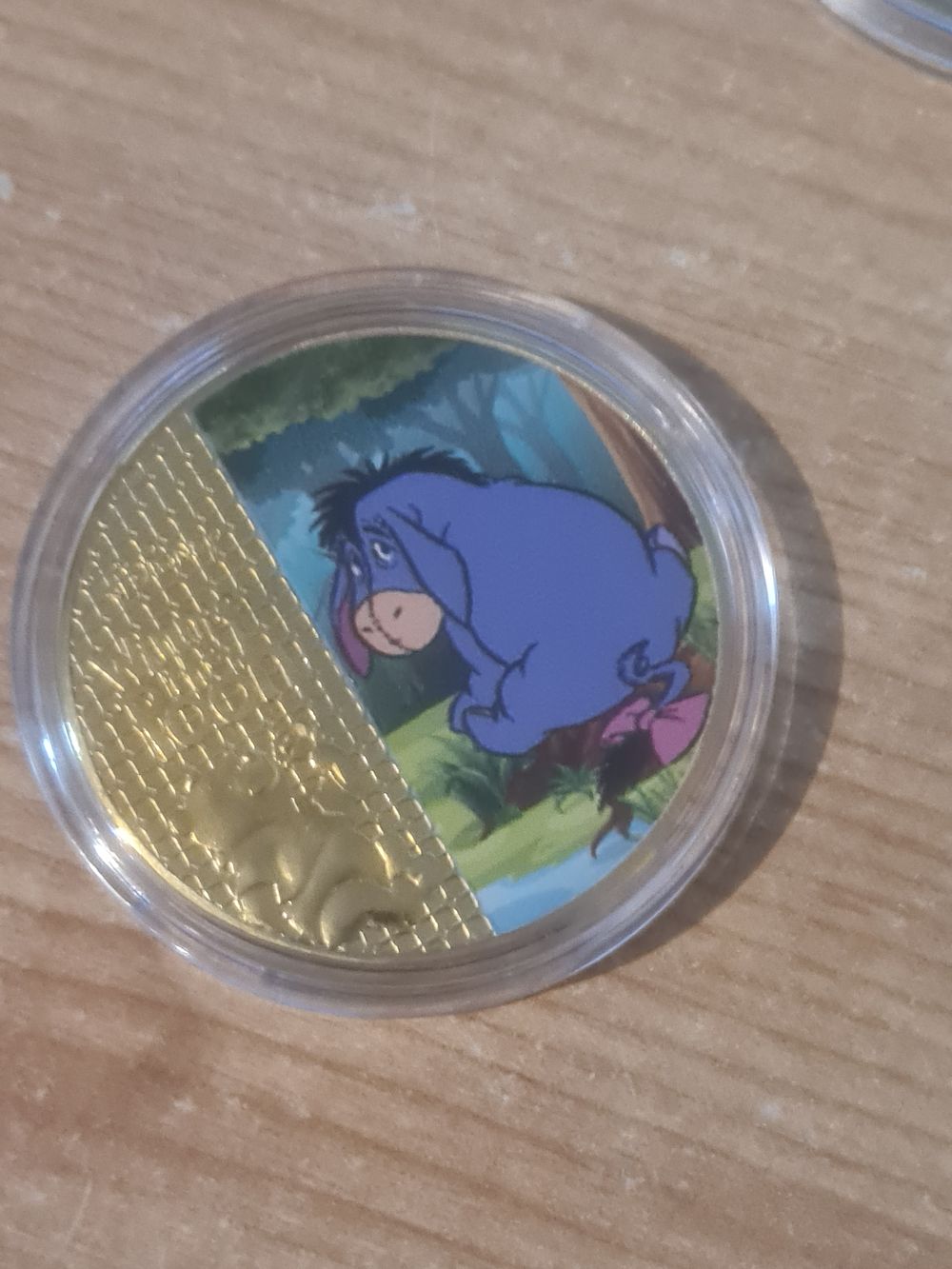 Lot 223: Winnie the poo collecters coin