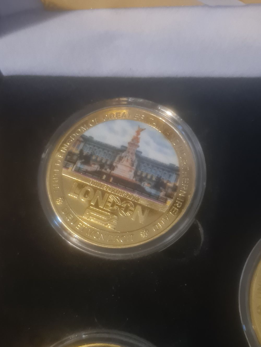 Lot 218: Cased london coin