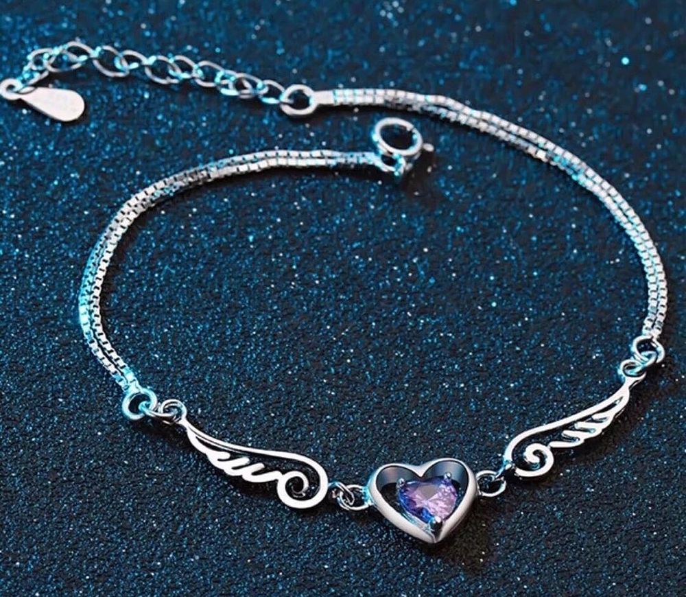 Lot 320: S925 angel bangle