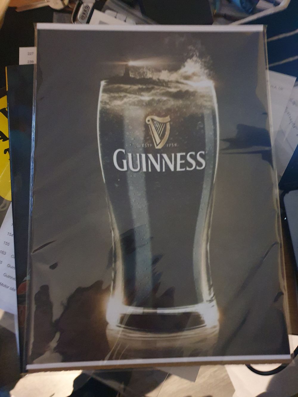 Lot 375: High gloss print in cardboard sleeve guinness