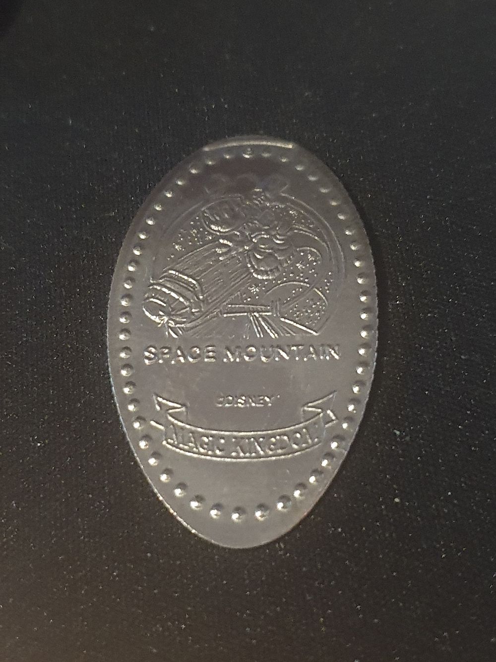 Lot 144: Space mountain badge
